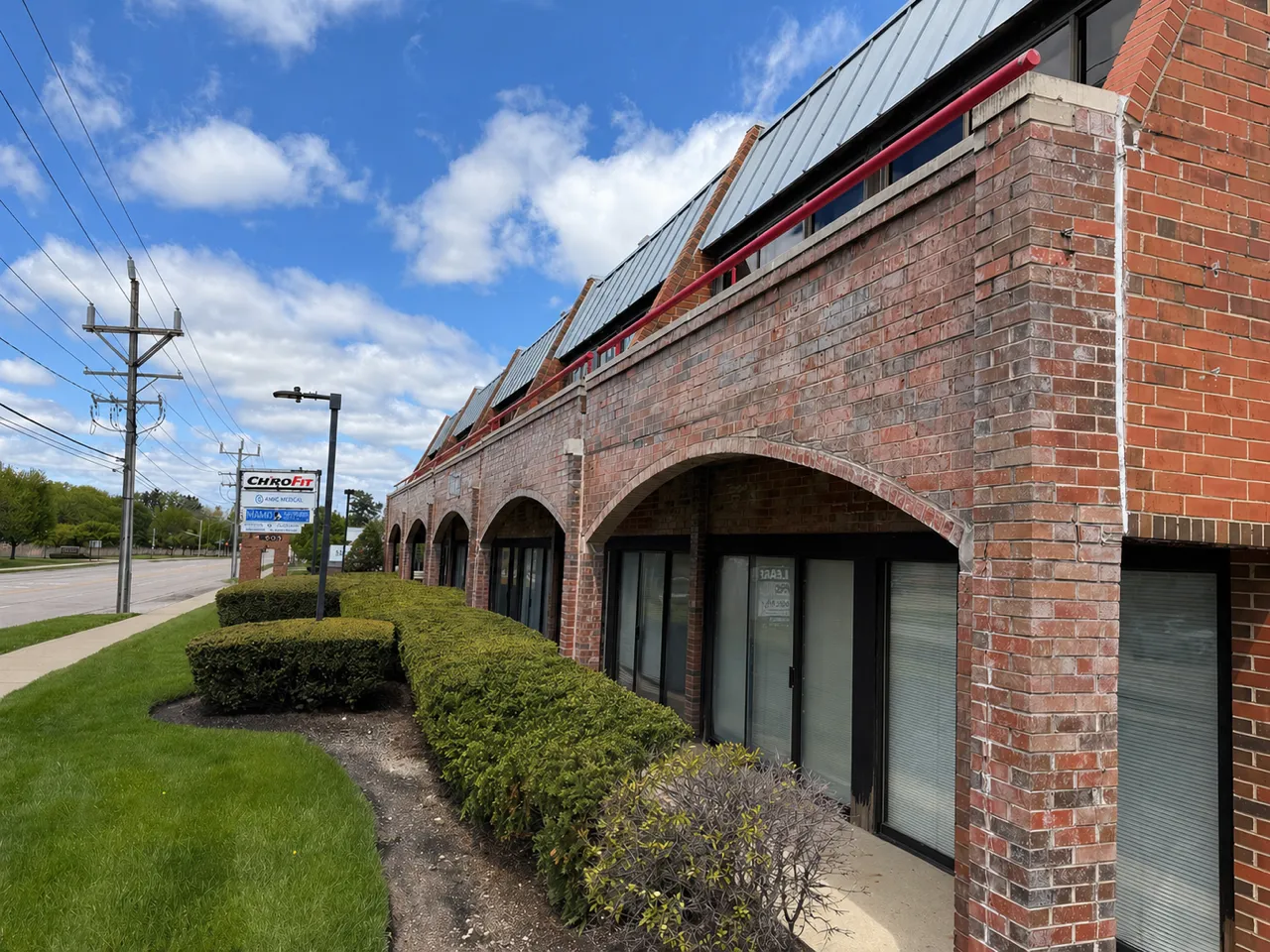 The ChiroFit building exterior with the practice sign.