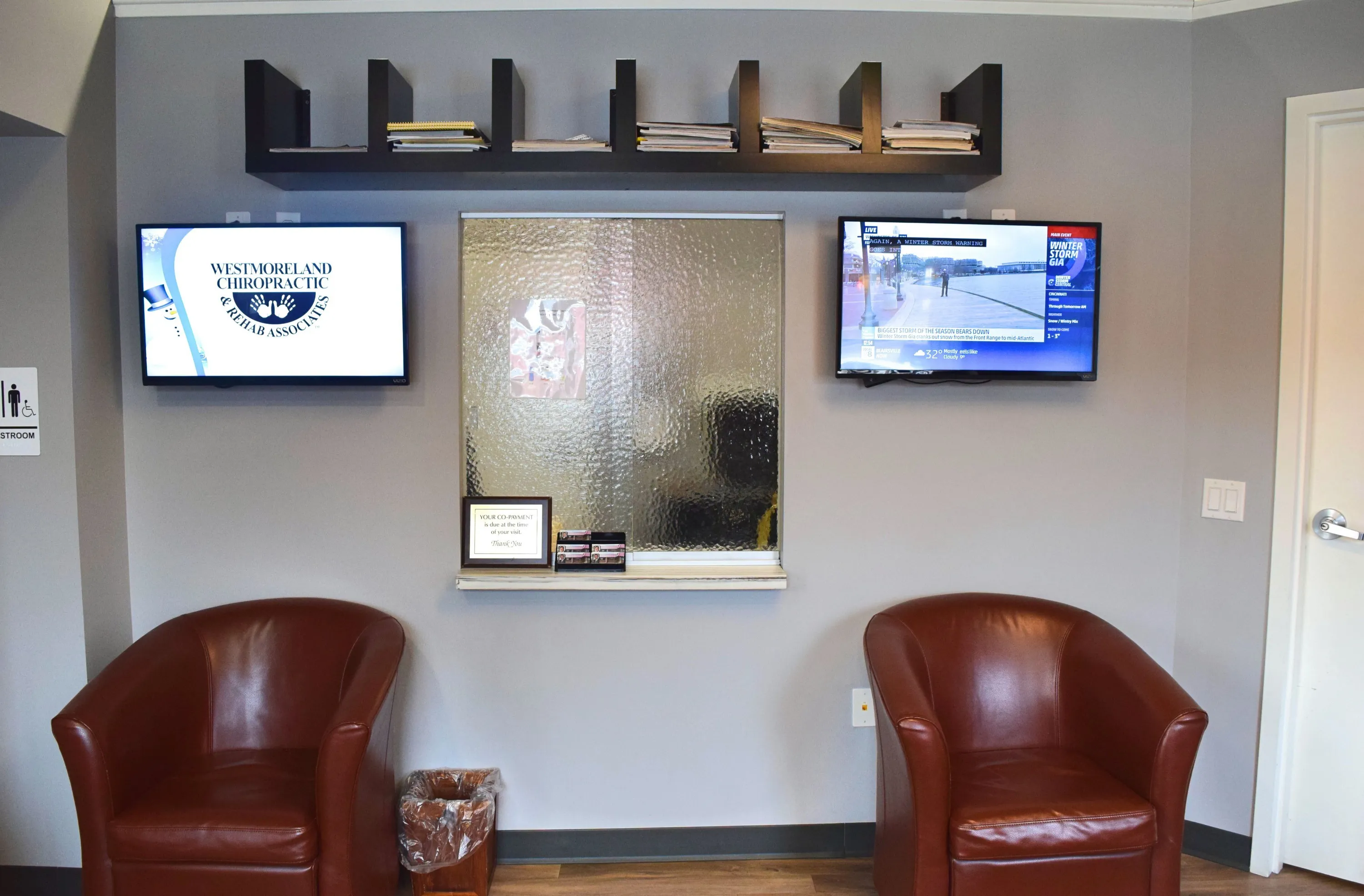 Healthcare professional consulting with patient