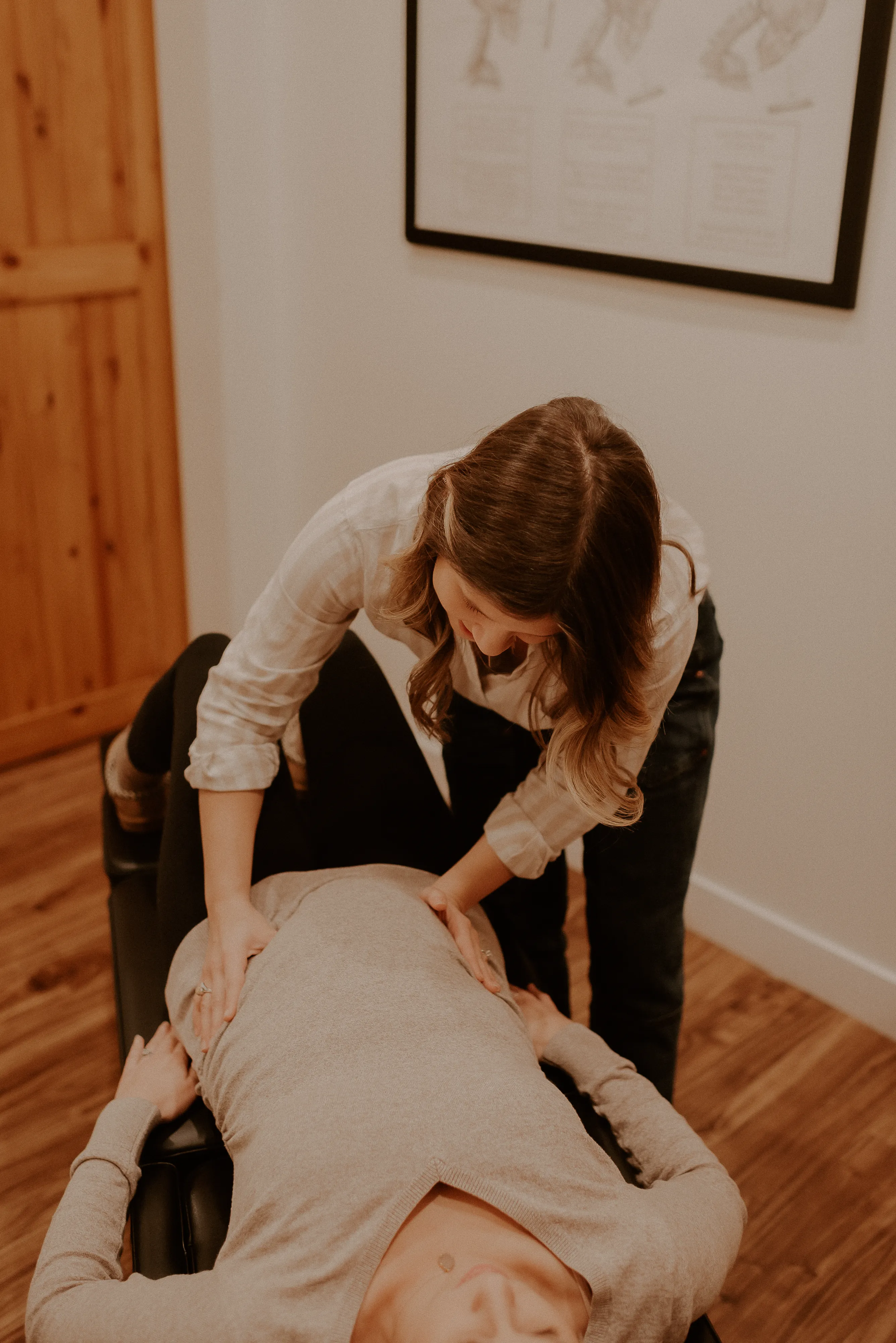 Prenatal chiropractic adjustment using the Webster Technique at Rise Chiropractic Co. in Bay City, Michigan.”