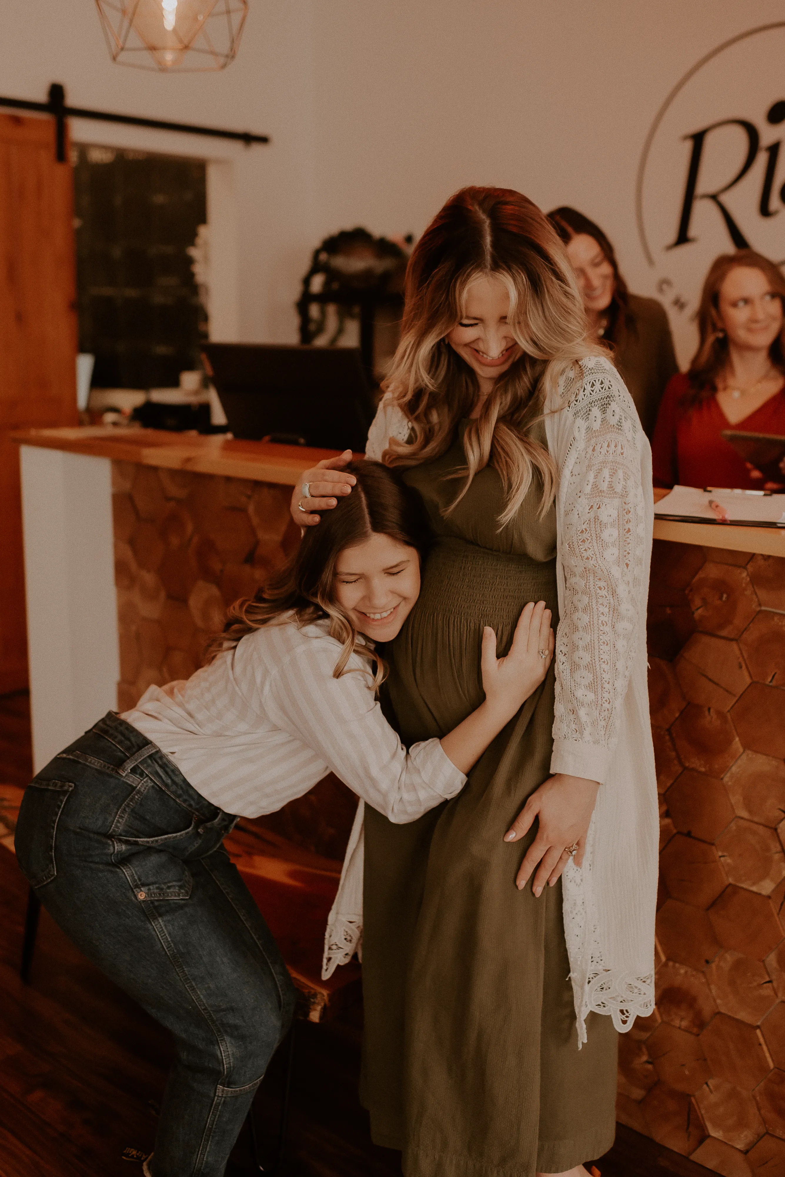 Prenatal chiropractic adjustment using the Webster Technique at Rise Chiropractic Co. in Bay City, Michigan.